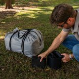 Often Sunday packed into its grey carry duffel with accessory bags, on the grass