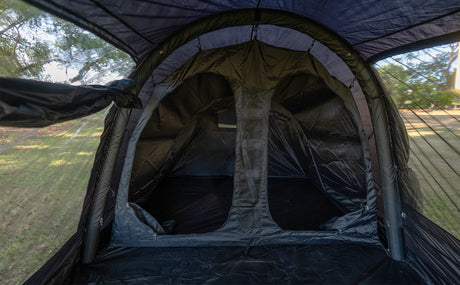Inside the Often Raven, looking from the front room at the black inner tent and its two doors